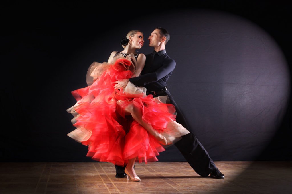 Happy couple ballroom dancing