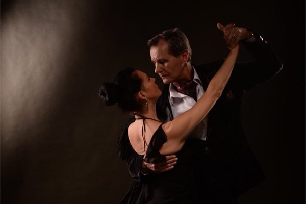 Intimite gaze of couple doing ballroom dancing